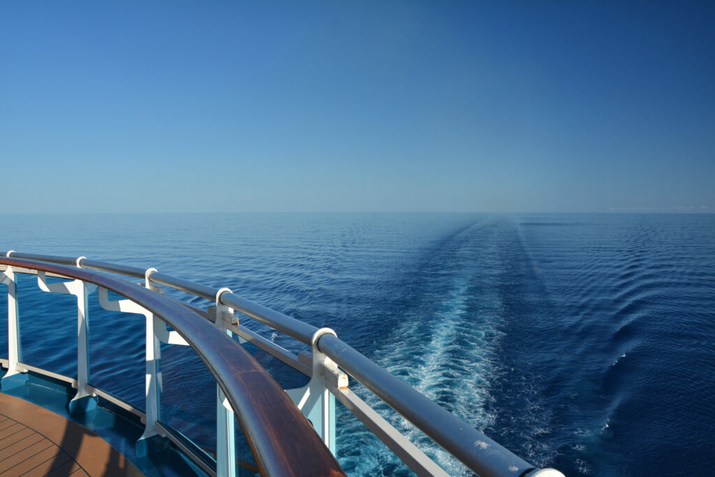 A scenic view from a cruise ship sailing at sea.